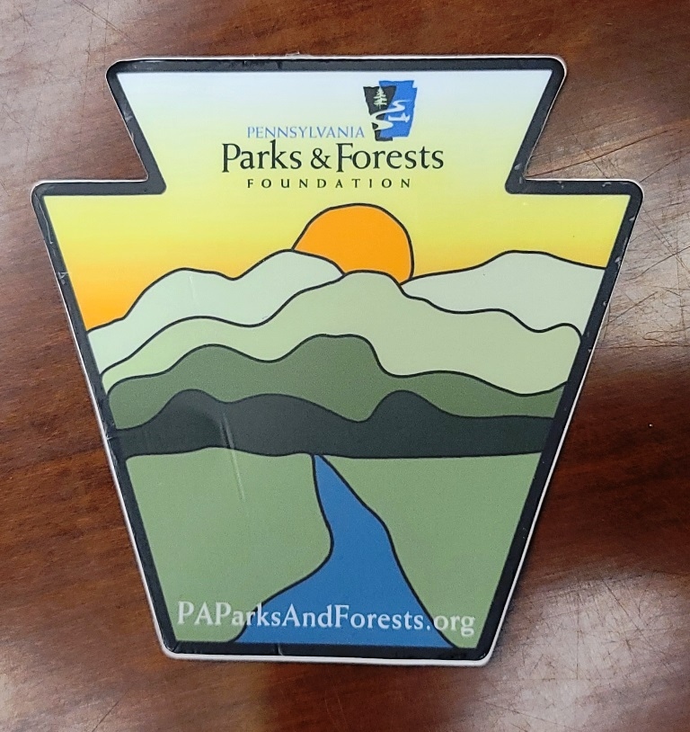 Product Description: Add a little color to your laptop, water bottle, or What Have You with a PPFF sticker. Extolling the virtues of the outdoor life, our stickers are a fun and friendly way to announce your devotion to outdoor recreation (an economic engine as well as a source of personal enjoyment). Check out the colorful sunrise featuring our PPFF logo and URL. It's a little larger than the others at 4"x4". And saluting PA Trails, two versions of Boots on the Ground. (Those two come in a patch as well.)</br> Stickers